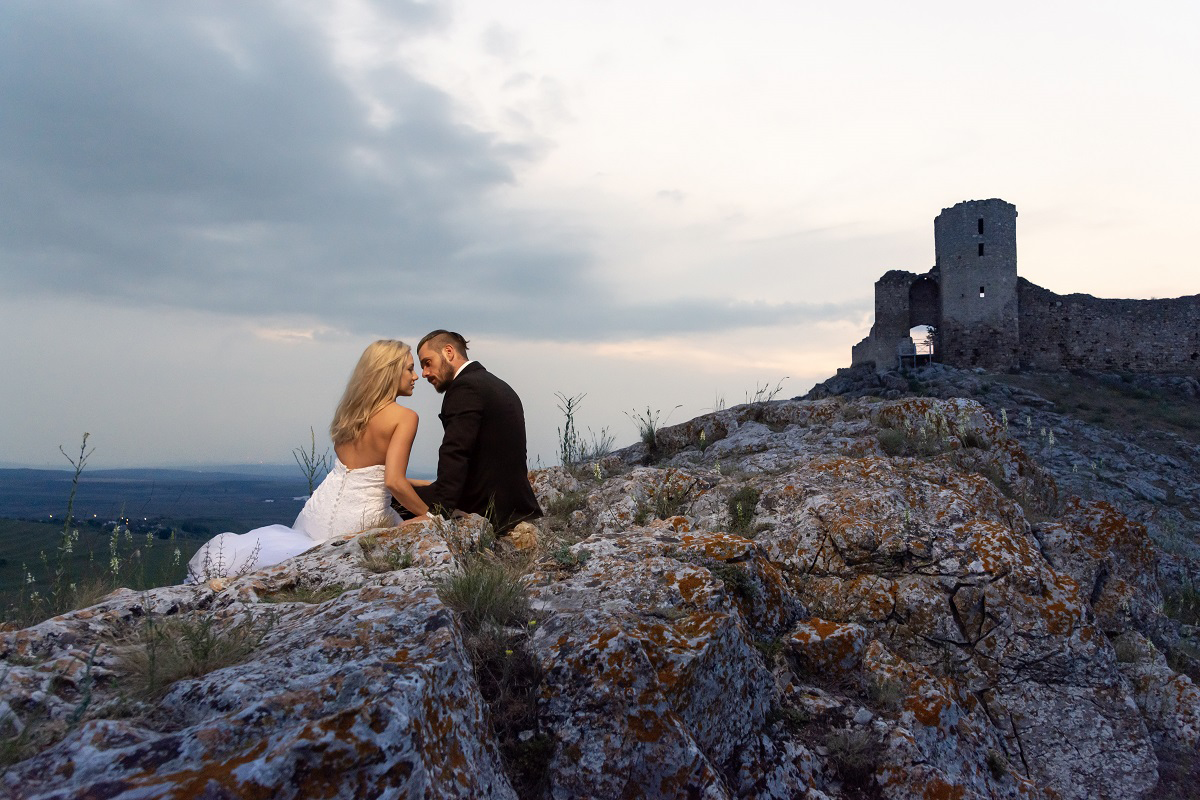 Intimate moment between bride and groom, Enisala Fortress, Romania