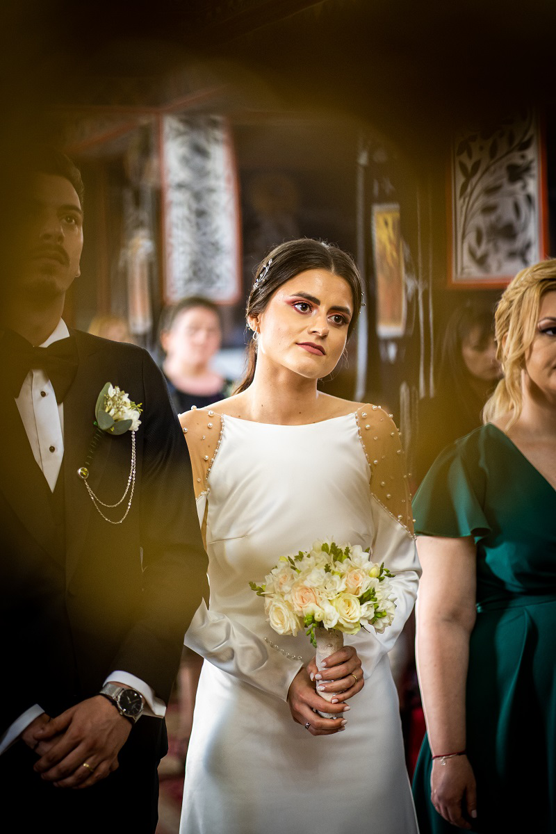 Bride and groom during a religious ceremony, Cluj-Napoca