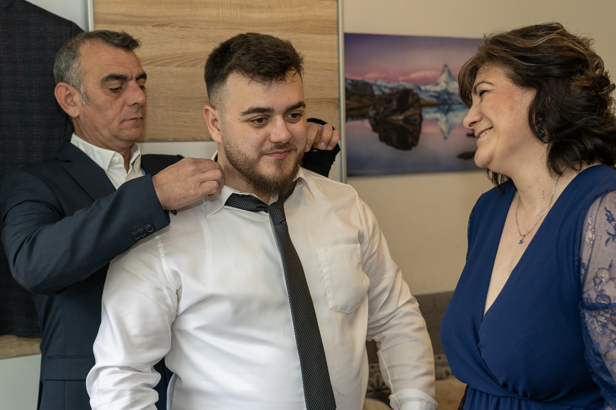Groom getting ready with parents assistance,Landsberg am Lech