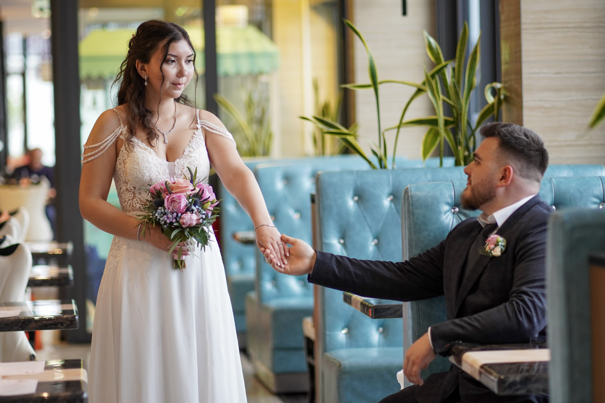 Romantic wedding at restaurant, holding hands,Landsberg am Lech
